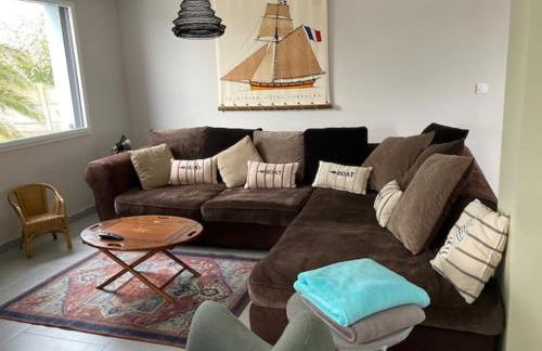 Les pieds dans le sable - Foto 1