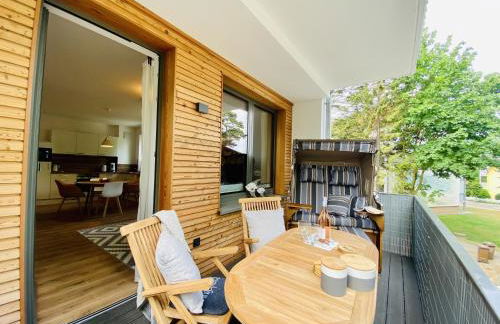 Ferienwohnung Strandkorb & Mee h r Parkvillen Carlota und Candela Baabe - Photo 7