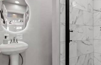 Stylish 2BR Dual-Kitchen Retreat Near Forest Park - Photo 17