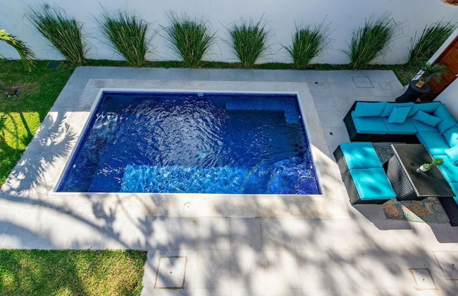 Ultramodern Townhome with an Inviting Coastal Design and Lush Outdoor Oasis with a Private Pool - Photo 26