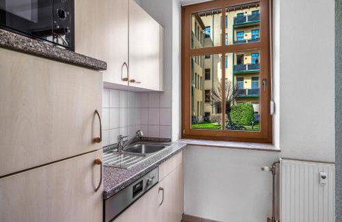 LeHaStays - Apartments Buckau 16a I Küche I Smart TV mit Netflix I toller Innenhof - Photo 20