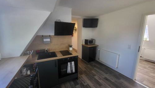 Gemütliche Wohnung mit großer Dachterrasse - Foto 1