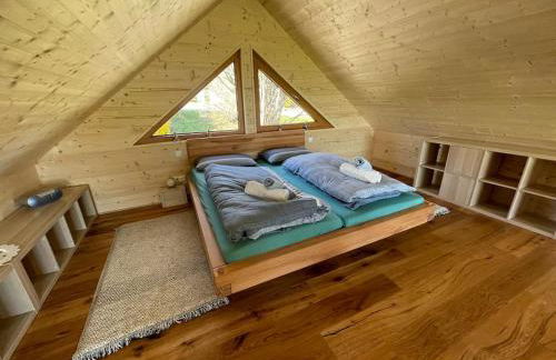 Zweistöckiges Natur-Holzhaus mit Berg- & Seesicht - Foto 8