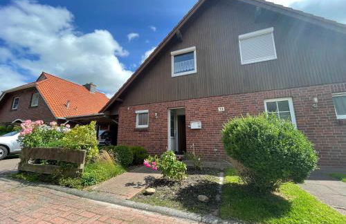 Haus Tillmann mit Hund in Hooksiel - Foto 1