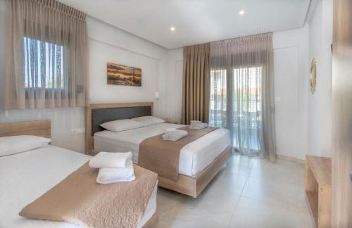 Sunshine Rooms and Suites - Foto 2