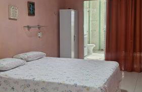 Aconchego da Marci Grande quarto confortável - Foto 1