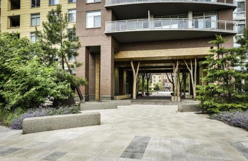 Comfy 2BR Oasis with Scenic Rooftop & Gym - Photo 44