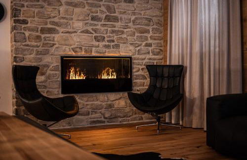 Die Zwei Sonnen Chalets - Photo 26