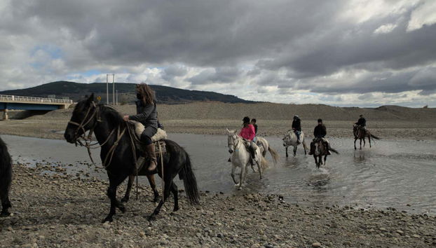 Hop on this horseriding tour through Agua Fresca Bay