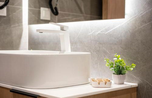 Unicos City Suites - Photo 49