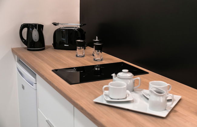 Ohasis Boutique Suites - Photo 14