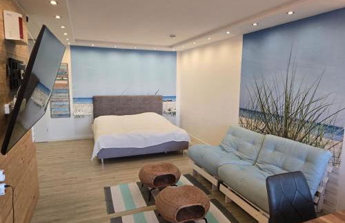 Moderne Wohnung mit Sonnenuntergang über dem Meer - Foto 5