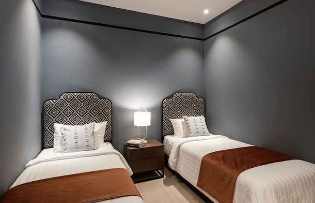 Ami Suites - Photo 10