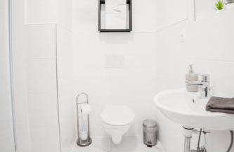 Nord-Apartment 3 I 1 Zimmer mit großzügigen Wohnbereich & Fußbodenheizung - Photo 12