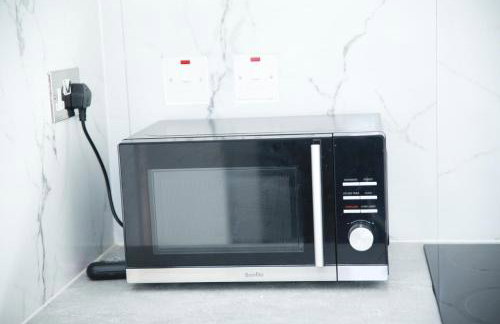 Central Harrow Cozy Apartment with free parking - Photo 14