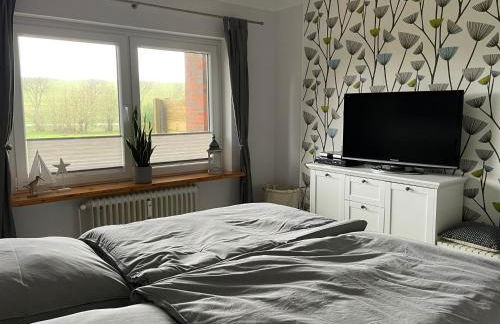 Freundliche Ferienwohnung direkt hinter dem Deich - Foto 15