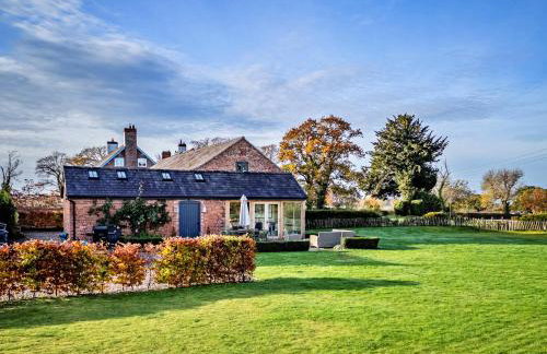 Finest Retreats - The Coach House at Tybroughton - Photo 1