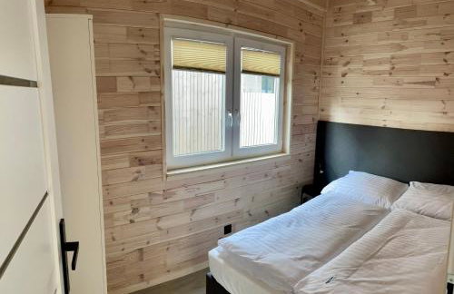 A Morze Domki- Podgrzewany basen, całoroczne klimatyzowane domki, parking - Foto 14