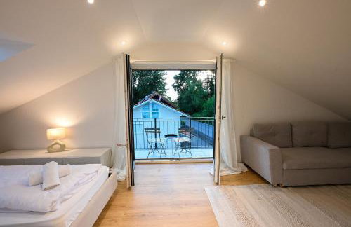 Liboria I Stylische Maisonette Wohnung Alpenblick I 4min zum See - Foto 37