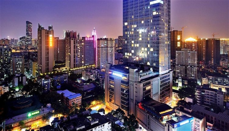 Foto 1 - South & North International Apartment - Beijing Road Kam Rueng Plaza