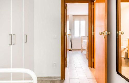 Charming Apartment With Vibrant Accents - Photo 17