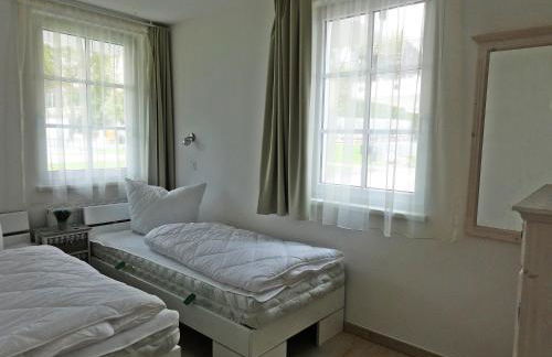 3 Zimmer Ferienwohnung Haus Meeresblick mit Meerblick A005 mit Südterrasse und Strandkorb - Foto 10