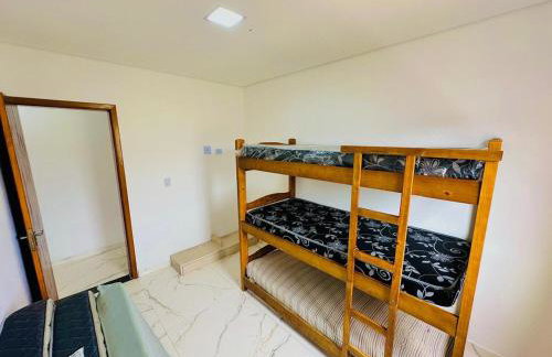 Casa em Itanhaém praia pé na areia - Photo 12