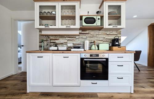 Alpha Apartments - Photo 20