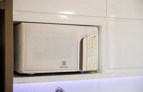 Aconchego e privacidade para sua família com 2 quartos, sala e cozinha integrados e sacada com churrasqueira - Foto 39