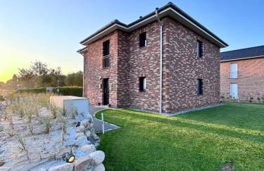 Haus Viking mit 2 Ferienwohnungen Bjorn 4 Pers und Floki 6 Pers mit Düne und Garten - Foto 2