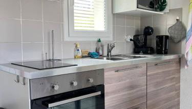 Chez Maïka et Etienne - Photo 3, stove, dishwasher, toaster