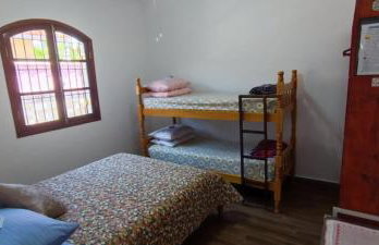 Casa Rosa de Peruíbe - Casa de Temporada 3 dormitórios, 10 hóspedes, piscina, wi-fi, netflix, 800 metros da praia - Photo 20
