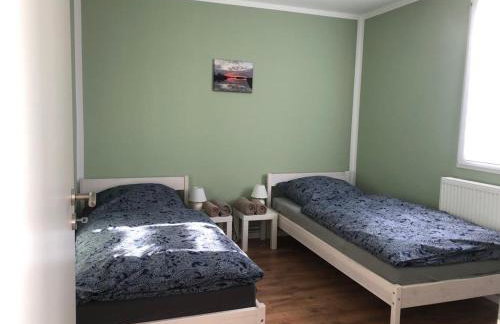 Moderne Ferienwohnungen mit Terrasse, Pool, Wallbox & Spielplatz in den Götzer Bergen - ideal für Ihren Berlin-Besuch und auch für Gruppen bis zu 40 Personen geeignet - Photo 8