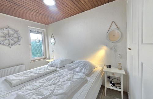 Ferienhaus Lüttje Uttiet mit eingezäunten Garten - Foto 7