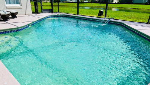 CozyCove near Disney Universal Pool Home Sleeps 10 - Foto 2, sunbed