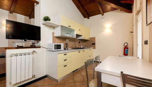 335 - Residence Montebello Monolocale C, Relax nel verde con Piscina - Foto 4, stove