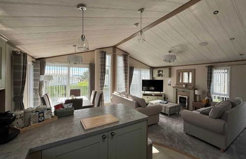 Highland Holiday Getaways - The Heilan' Lodge - Foto 5