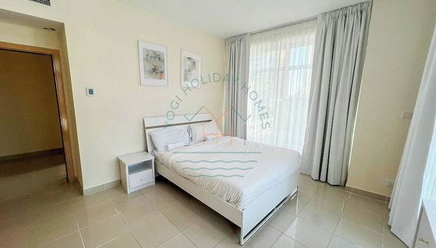 Blakely 2BR Lakeview Retreat With Open Balcony - Foto 4, Habitación