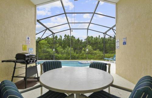 Themed 4BR house pool game room 10 min Disney - Photo 8