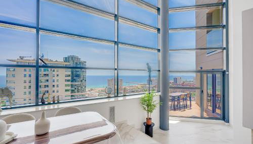 Penthouse Duplex with TOP Views! - Photo 2