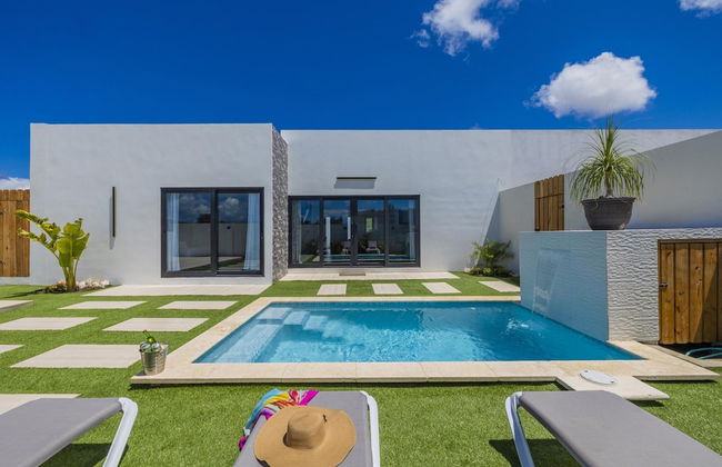 Brand NEW 3BR w Private Pool Walk to Palm Beach - Photo 9