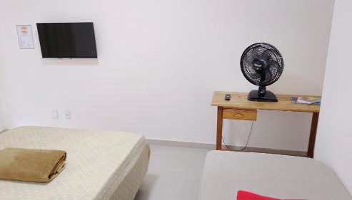 Suíte privativa aconchego a alguns passos da praia - Foto 2