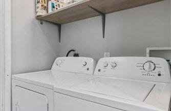 Stylish 2BR Dual-Kitchen Retreat Near Forest Park - Photo 27