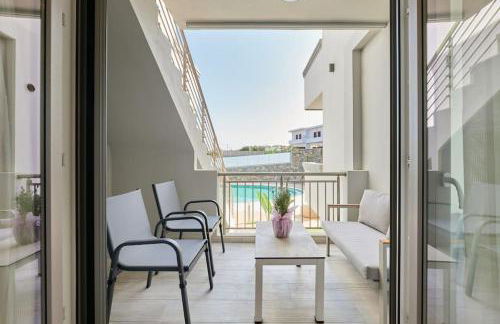 Comfy apartmt near beach with pool dining area - Photo 20