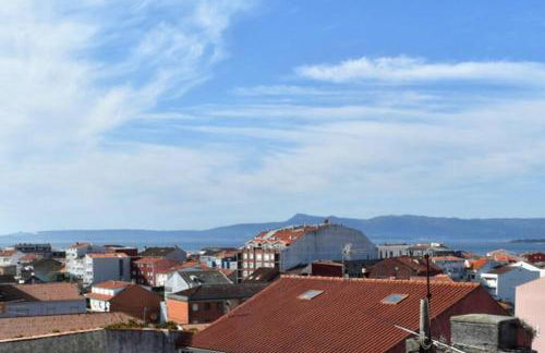 GALIHOST - Precioso ático en pleno centro de O Grove - Photo 18