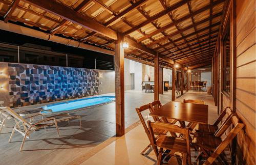 casadecastelhanos, Quadra do MAR de CASTELHANOS, 4 suítes com AR, Churrasqueira, Piscina, Hidromassagem, Cozinha INTEGRADA GOURMET Ideal para FAMÍLIA E AMIGOS - Foto 43