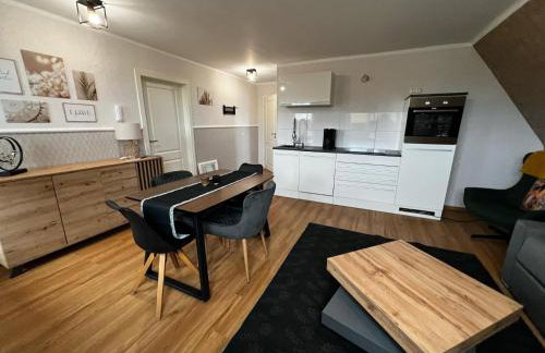 Haus-Fehmarn-am-Dorfteich-|-Wohnung-1-Sued - Foto 1