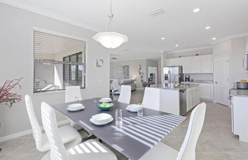 Modern waterfront home in Artesia with pool/gym - Photo 13