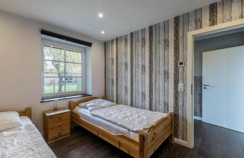 Modernes Holzhaus mit traumhaftem Deichblick - Foto 16