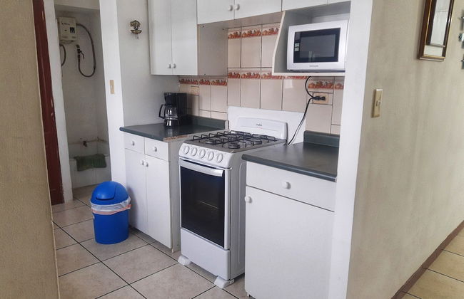 Suites & Apartments San Benito Flats - Photo 12